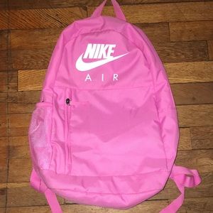 hot pink nike bookbag